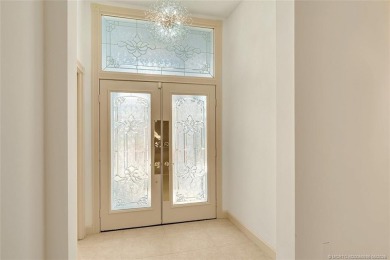 Absolutely Beautiful & stylish LAKEFRONT Divosta built home on Monarch Country Club in Florida - for sale on GolfHomes.com, golf home, golf lot