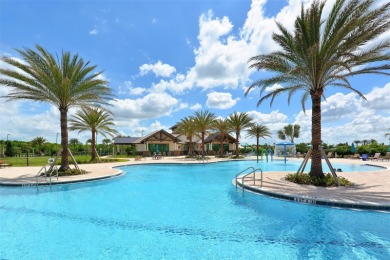 Positioned on a premier south-facing homesite with serene lake on Ritz-Carlton Members Golf Club in Florida - for sale on GolfHomes.com, golf home, golf lot