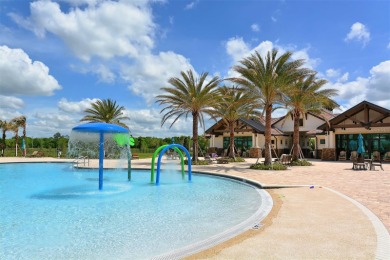 Positioned on a premier south-facing homesite with serene lake on Ritz-Carlton Members Golf Club in Florida - for sale on GolfHomes.com, golf home, golf lot