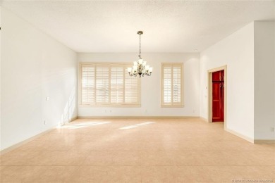 Absolutely Beautiful & stylish LAKEFRONT Divosta built home on Monarch Country Club in Florida - for sale on GolfHomes.com, golf home, golf lot