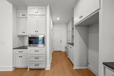 Simplify your life with an ALL NEW MAINTENANCE PROVIDED CUSTOM on Lakewood Oaks Golf Club, Ltd. in Missouri - for sale on GolfHomes.com, golf home, golf lot