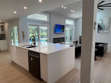 Witness the absolute perfection of this chic, sophisticated on TPC Prestancia in Florida - for sale on GolfHomes.com, golf home, golf lot