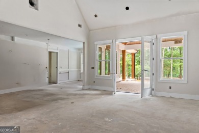 Nestled in the prestigious gated community of Harbor Club on on Harbor Club Golf and Country Club in Georgia - for sale on GolfHomes.com, golf home, golf lot