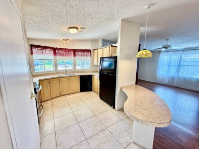Home is located in Water Oak Country Club Estates an active 55 on Water Oak Country Club Estates in Florida - for sale on GolfHomes.com, golf home, golf lot