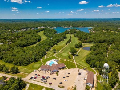 Amazing wooded & gently sloping walkout lot on .49 acres on Raintree Country Club in Missouri - for sale on GolfHomes.com, golf home, golf lot