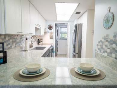 Start your day with a coffee while watching the sunrise over the on Key Colony Beach Golf Course in Florida - for sale on GolfHomes.com, golf home, golf lot