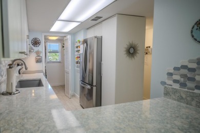 Start your day with a coffee while watching the sunrise over the on Key Colony Beach Golf Course in Florida - for sale on GolfHomes.com, golf home, golf lot