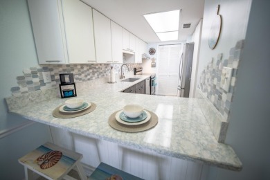 Start your day with a coffee while watching the sunrise over the on Key Colony Beach Golf Course in Florida - for sale on GolfHomes.com, golf home, golf lot