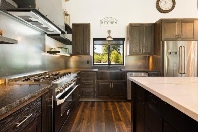 A standout golf-course residence nestled in the scenic Bailey on Bailey Creek Golf Course in California - for sale on GolfHomes.com, golf home, golf lot