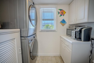 Start your day with a coffee while watching the sunrise over the on Key Colony Beach Golf Course in Florida - for sale on GolfHomes.com, golf home, golf lot
