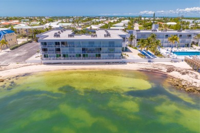 Start your day with a coffee while watching the sunrise over the on Key Colony Beach Golf Course in Florida - for sale on GolfHomes.com, golf home, golf lot