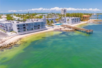 Start your day with a coffee while watching the sunrise over the on Key Colony Beach Golf Course in Florida - for sale on GolfHomes.com, golf home, golf lot