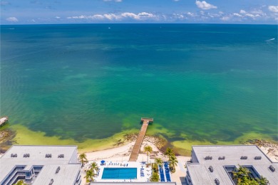 Start your day with a coffee while watching the sunrise over the on Key Colony Beach Golf Course in Florida - for sale on GolfHomes.com, golf home, golf lot