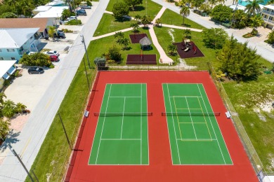 Start your day with a coffee while watching the sunrise over the on Key Colony Beach Golf Course in Florida - for sale on GolfHomes.com, golf home, golf lot