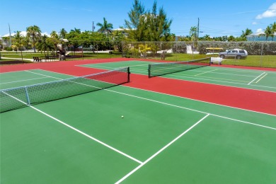 Start your day with a coffee while watching the sunrise over the on Key Colony Beach Golf Course in Florida - for sale on GolfHomes.com, golf home, golf lot