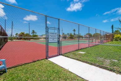 Start your day with a coffee while watching the sunrise over the on Key Colony Beach Golf Course in Florida - for sale on GolfHomes.com, golf home, golf lot