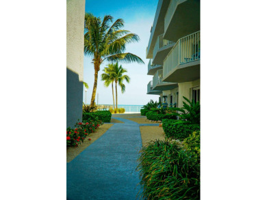 Start your day with a coffee while watching the sunrise over the on Key Colony Beach Golf Course in Florida - for sale on GolfHomes.com, golf home, golf lot