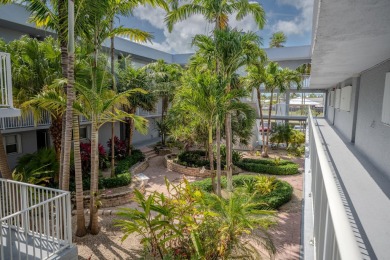 Start your day with a coffee while watching the sunrise over the on Key Colony Beach Golf Course in Florida - for sale on GolfHomes.com, golf home, golf lot