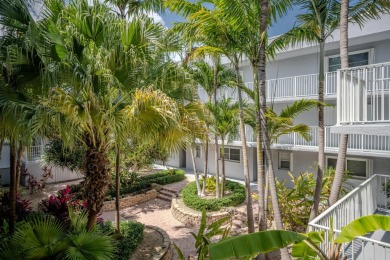 Start your day with a coffee while watching the sunrise over the on Key Colony Beach Golf Course in Florida - for sale on GolfHomes.com, golf home, golf lot