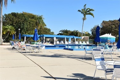 Bright and spacious 2BR/2BA corner unit with views of the on Sunrise Lakes Phase IV Golf Course in Florida - for sale on GolfHomes.com, golf home, golf lot