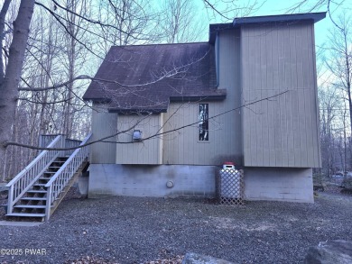 DISCOVER YOUR DREAM ESCAPE in this stunning three-bedroom, two on The Hideout Golf in Pennsylvania - for sale on GolfHomes.com, golf home, golf lot