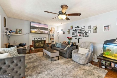 Welcome home to this beautiful contemporary home, spread out on on Canongate At Georgia National Golf Club in Georgia - for sale on GolfHomes.com, golf home, golf lot