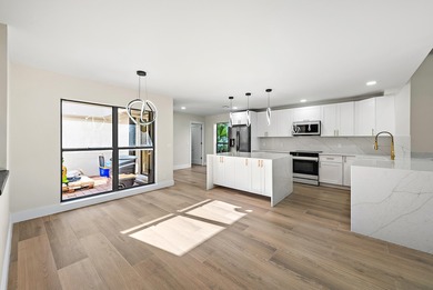 Welcome to 37 Edinburgh, one of a kind fully remodeled, large on PGA National Golf Club in Florida - for sale on GolfHomes.com, golf home, golf lot