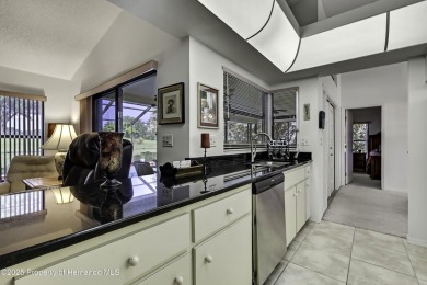 This stunning 3-bedroom, 3-bath pool home in the highly on Timber Pines Golf Course in Florida - for sale on GolfHomes.com, golf home, golf lot