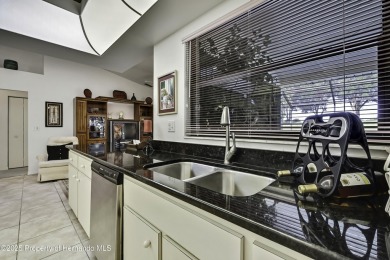 This stunning 3-bedroom, 3-bath pool home in the highly on Timber Pines Golf Course in Florida - for sale on GolfHomes.com, golf home, golf lot