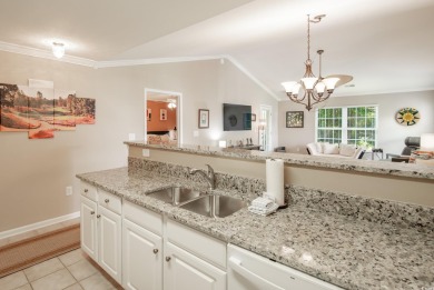 Welcome to coastal living at its finest! Updated kitchen granite on True Blue Plantation in South Carolina - for sale on GolfHomes.com, golf home, golf lot