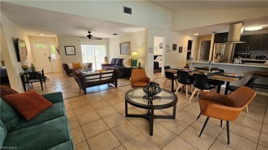 Spacious San Carlos home with pool & jacuzzi on a prime corner on Estero Country Club in Florida - for sale on GolfHomes.com, golf home, golf lot