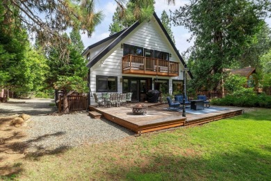 Perched along the second tee box of the Lake Almanor Country on Lake Almanor Country Club in California - for sale on GolfHomes.com, golf home, golf lot