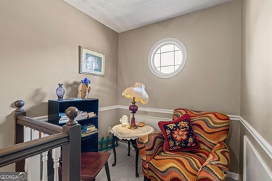 Welcome home to this beautiful contemporary home, spread out on on Canongate At Georgia National Golf Club in Georgia - for sale on GolfHomes.com, golf home, golf lot