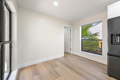 Welcome to 37 Edinburgh, one of a kind fully remodeled, large on PGA National Golf Club in Florida - for sale on GolfHomes.com, golf home, golf lot