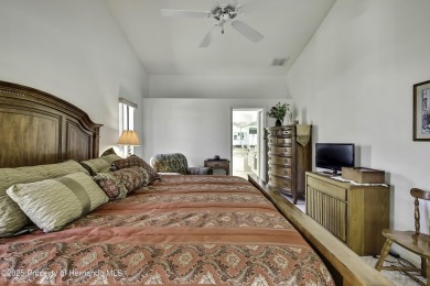 This stunning 3-bedroom, 3-bath pool home in the highly on Timber Pines Golf Course in Florida - for sale on GolfHomes.com, golf home, golf lot