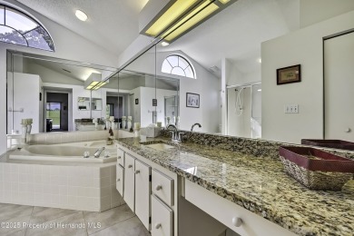 This stunning 3-bedroom, 3-bath pool home in the highly on Timber Pines Golf Course in Florida - for sale on GolfHomes.com, golf home, golf lot