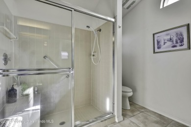 This stunning 3-bedroom, 3-bath pool home in the highly on Timber Pines Golf Course in Florida - for sale on GolfHomes.com, golf home, golf lot