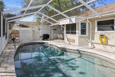 Under contract-accepting backup offers. Nestled in the quiet on Tarpon Springs Golf Course in Florida - for sale on GolfHomes.com, golf home, golf lot