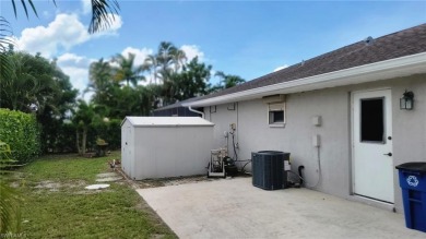 Spacious San Carlos home with pool & jacuzzi on a prime corner on Estero Country Club in Florida - for sale on GolfHomes.com, golf home, golf lot