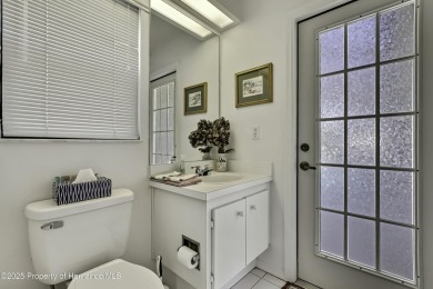 This stunning 3-bedroom, 3-bath pool home in the highly on Timber Pines Golf Course in Florida - for sale on GolfHomes.com, golf home, golf lot
