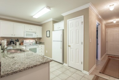 Welcome to coastal living at its finest! Updated kitchen granite on True Blue Plantation in South Carolina - for sale on GolfHomes.com, golf home, golf lot