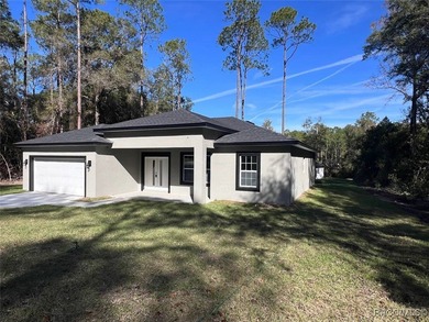 BRAND-NEW CONSTRUCTION, MOVE-IN READY! Discover this stunning on Citrus Springs Country Club in Florida - for sale on GolfHomes.com, golf home, golf lot