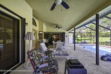 This stunning 3-bedroom, 3-bath pool home in the highly on Timber Pines Golf Course in Florida - for sale on GolfHomes.com, golf home, golf lot