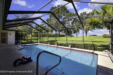 This stunning 3-bedroom, 3-bath pool home in the highly on Timber Pines Golf Course in Florida - for sale on GolfHomes.com, golf home, golf lot