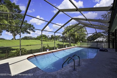 This stunning 3-bedroom, 3-bath pool home in the highly on Timber Pines Golf Course in Florida - for sale on GolfHomes.com, golf home, golf lot