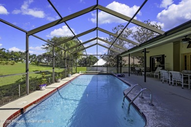 This stunning 3-bedroom, 3-bath pool home in the highly on Timber Pines Golf Course in Florida - for sale on GolfHomes.com, golf home, golf lot