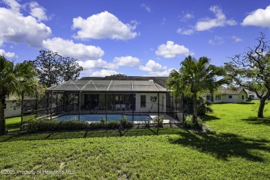 This stunning 3-bedroom, 3-bath pool home in the highly on Timber Pines Golf Course in Florida - for sale on GolfHomes.com, golf home, golf lot
