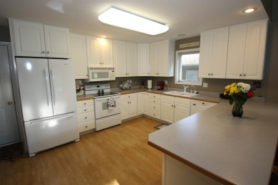 FOUR STARS!!!****This beautiful home situated strategically on on Emerald Hills Golf Club in Iowa - for sale on GolfHomes.com, golf home, golf lot