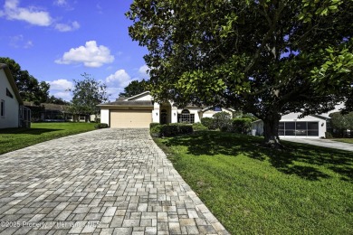 This stunning 3-bedroom, 3-bath pool home in the highly on Timber Pines Golf Course in Florida - for sale on GolfHomes.com, golf home, golf lot