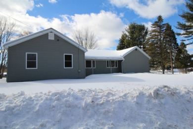 Charming Ranch-Style Home with Water View Nestled on a sprawling on Twin Brooks Golf Course in New York - for sale on GolfHomes.com, golf home, golf lot